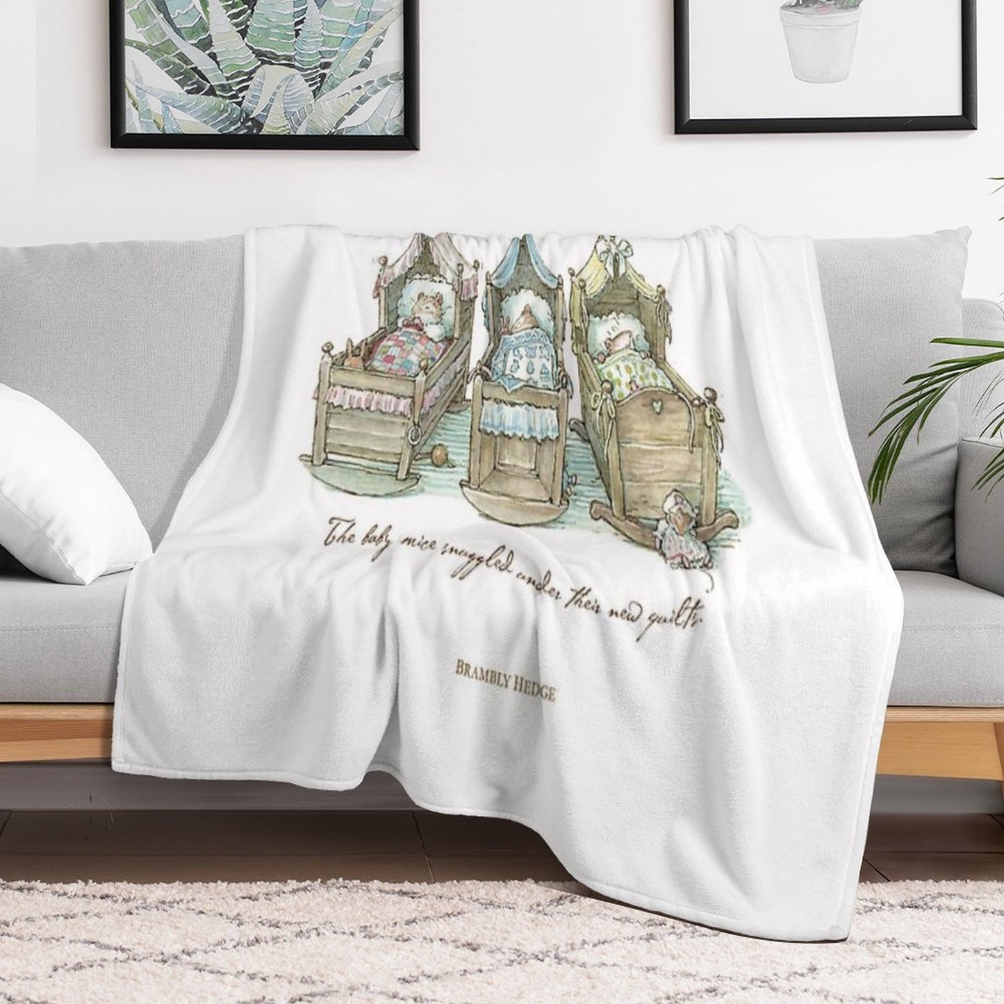 The Brambly Hedge Baby Mice Snuggle in Their Cots Sustainable Throw Blanket