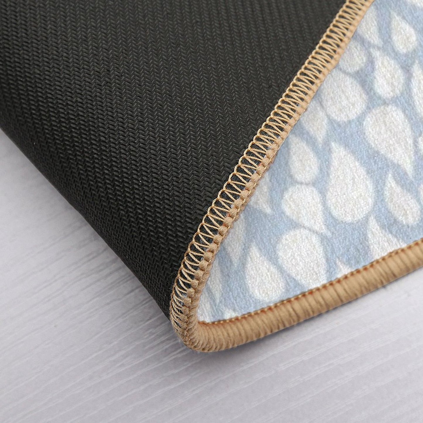 White Droptear on Light Blue Background Toxin-Free Bath Mat