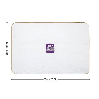 STOP CREATING LIMITATIONS (purple)  Absorbent Bath Mat