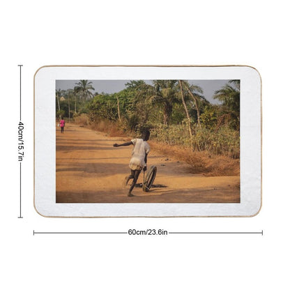 Africa Child Playing on The Village Street  Versatile Bath Mat